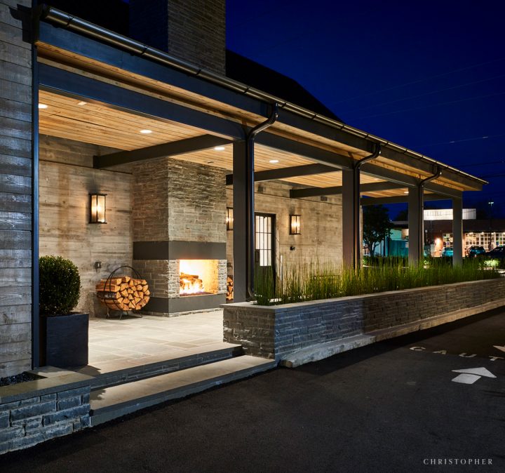 Caliber Rustic Exterior with Outdoor Fireplace and Covered Walkway