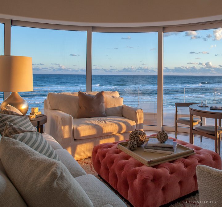 Coastal Luxury Living Room at Sunset with Beach View