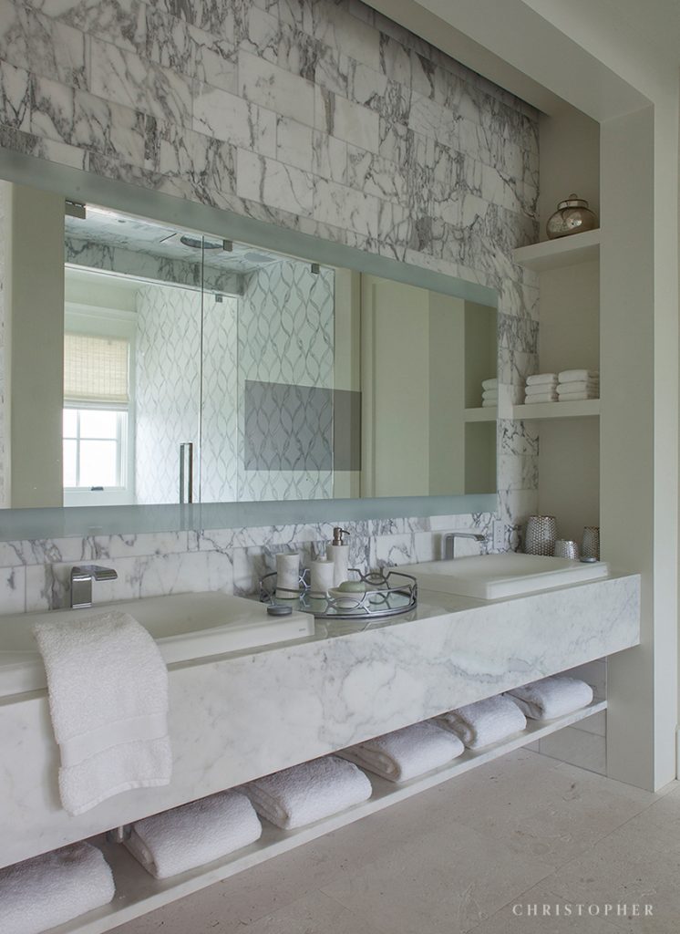 Coastal Luxury Master Bath with Floating Marble Vanity and Mirror with Built-in TV