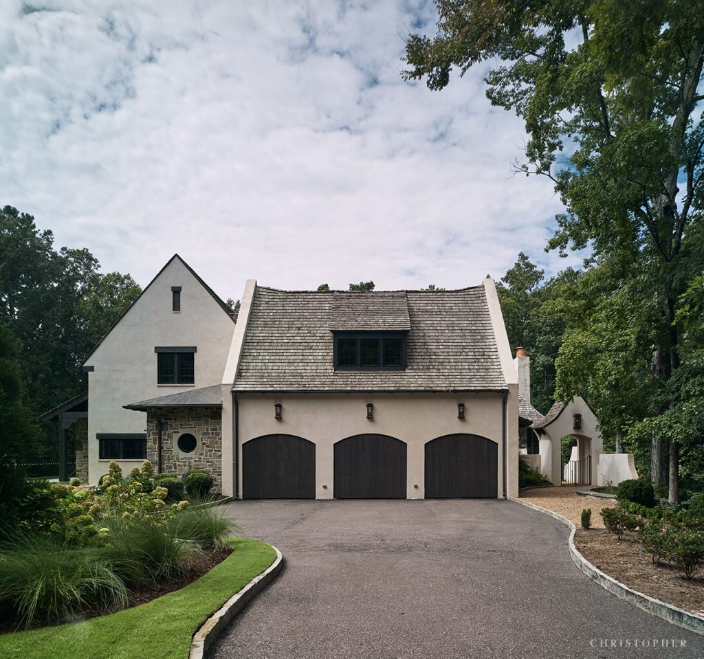 French Normandy Three Car Garage and ATV Storage and Mudroom