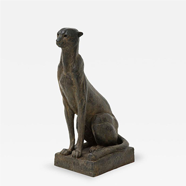 A contemporary bronze cheetah sculpture by sculptor Michel Lauricella